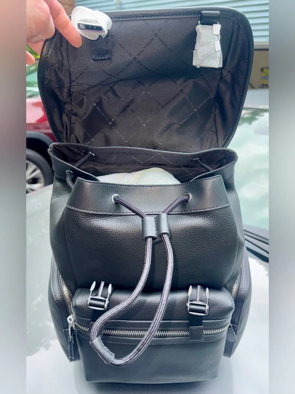 Michael Kors Black Pebbled Leather Flap Backpack